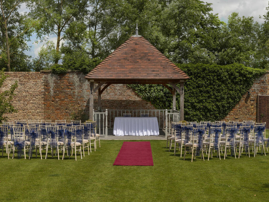 The Moat Garden set up for a wedding outside by the pavilion