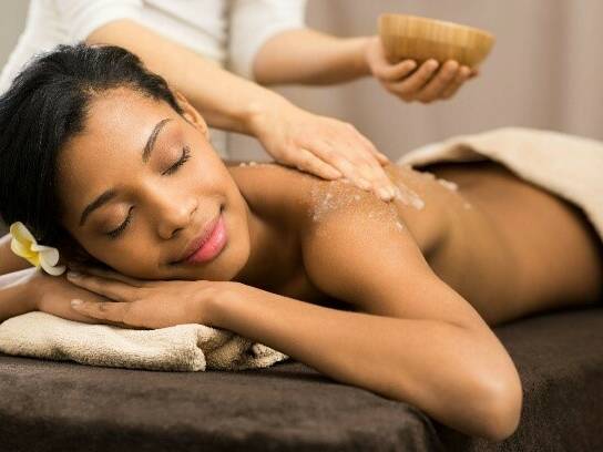 A woman getting a back massage