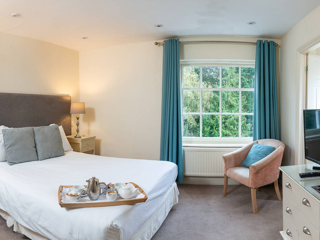 A picture of Hatherley Manor's Classic bedroom after the renovation