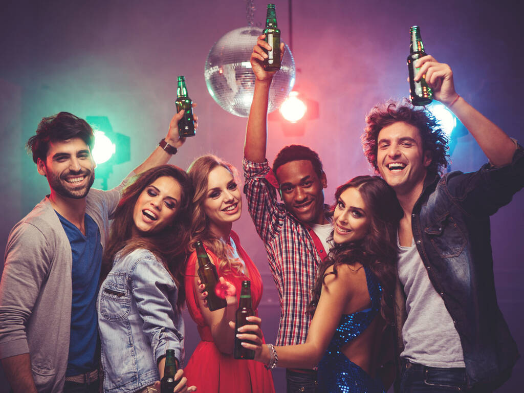 A stock image of six people raising a glass